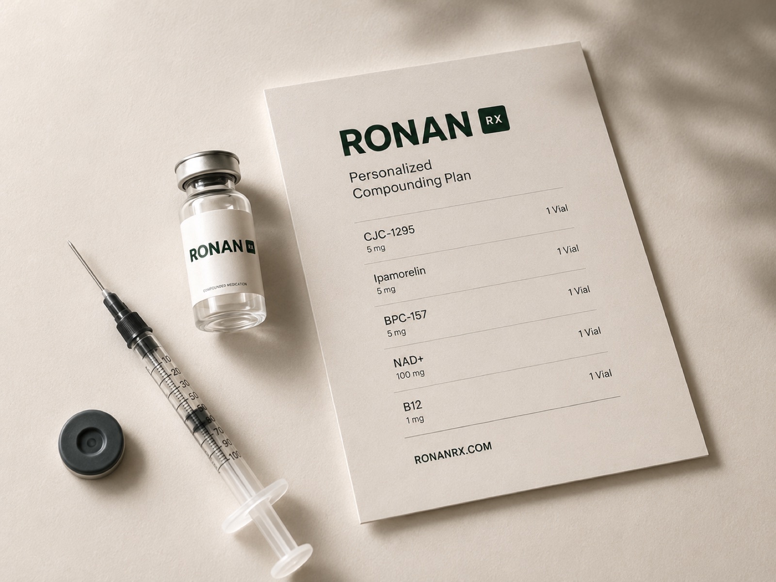 A personalized compounding plan, a labeled vial, and a syringe arranged on a cream surface.